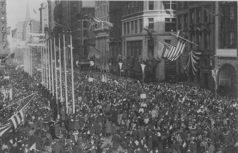 a crowded New York City street during Armistice Day