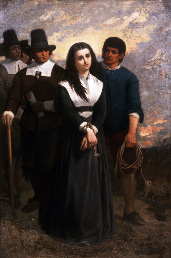 a painting of a woman being tried for witchcraft during the Salem Witch Trials