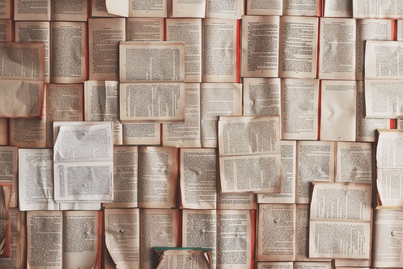 a pile of open books