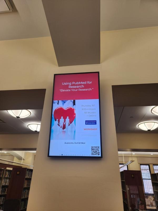 Slide showing a featured event in the library.