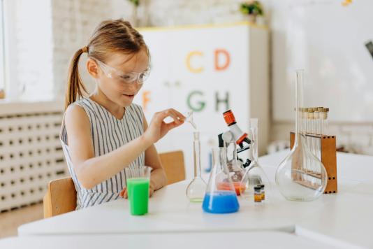 Girl_Conducting_Science_Experiment